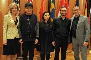 Judges Olga Kern (left) and Sebastian Lang-Lessing flank the three finalists in the Gurwitz International Piano Competition: Jiale Li (from left), Yedam Kim and Leonardo Colafelice.