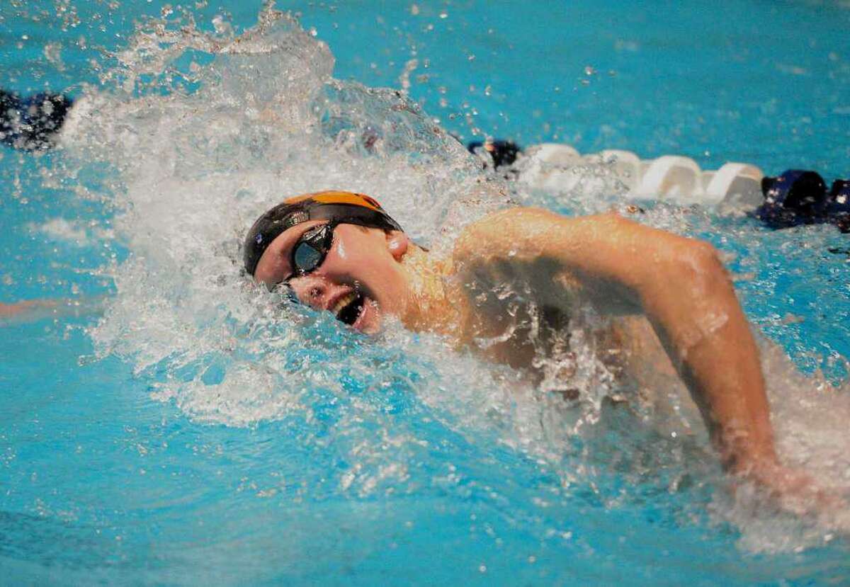Ridgefield High sophomore Connor Hunt swims to victory in the 500-yard freestyle at the State Open.