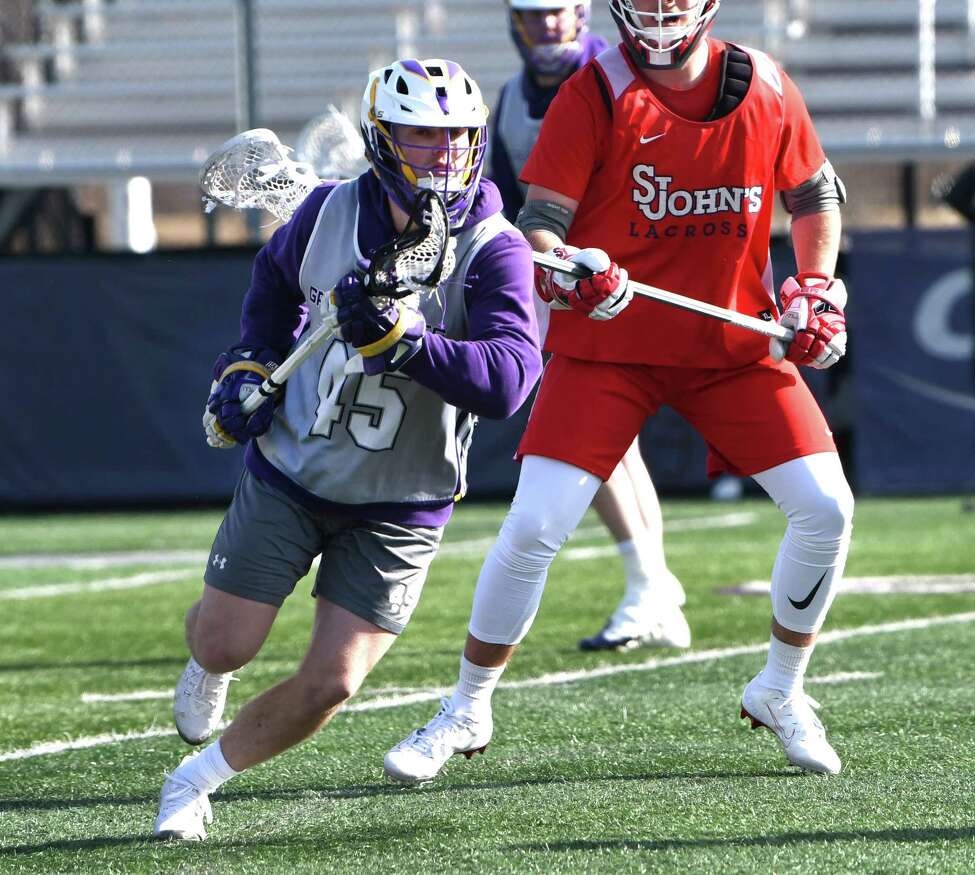 University at Albany Graydon Hogg (45) carries the ball during a scrimmage with St. John's at Casey Stadium on Thursday, Jan. 30, 2020 in Albany, N.Y. (Lori Van Buren/Times Union)