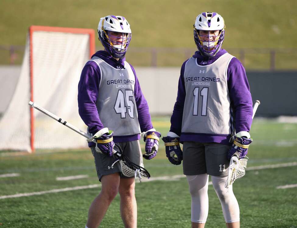 University at Albany's Graydon Hogg, #45, and Tehoka Nanticoke, #1, are seen during a scrimmage with St. John's at Casey Stadium on Thursday, Jan. 30, 2020 in Albany, N.Y. (Lori Van Buren/Times Union)