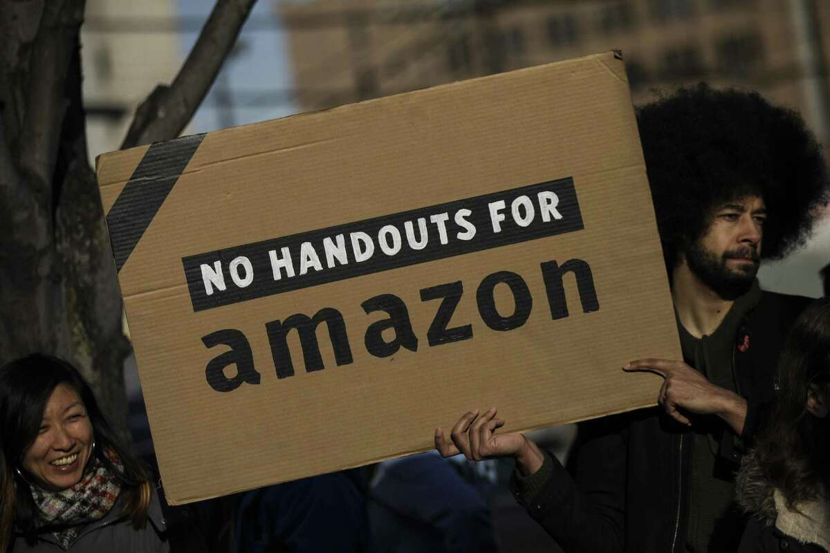 Activists and community members who opposed Amazon's plan to move into Queens rally in celebration of Amazon’s decision to pull out of the deal, in the Long Island City neighborhood, February 14, 2019 in the Queens borough of New York City.