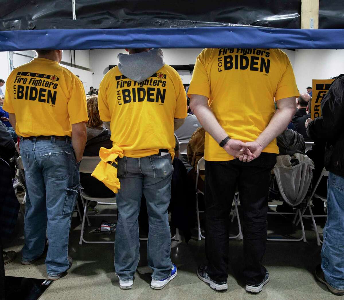 Supporters listen to former Vice President Joe Biden, a Democratic candidate for president, during a campaign event in Council Bluffs, Iowa on Wednesday, Jan. 29, 2020.