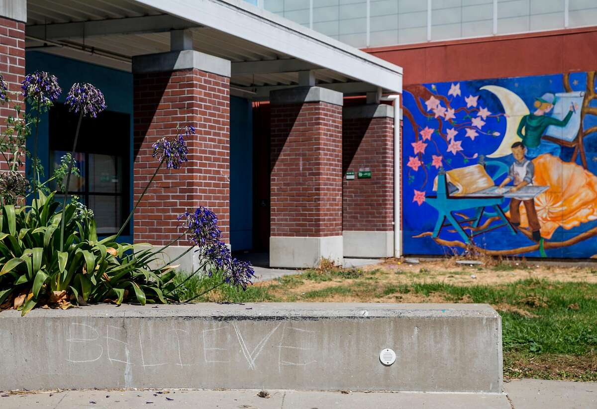The word "believe" is chalked on a ledge near the Art Center on campus at Laney College in Oakland, Calif. Friday, Aug. 31, 2018.