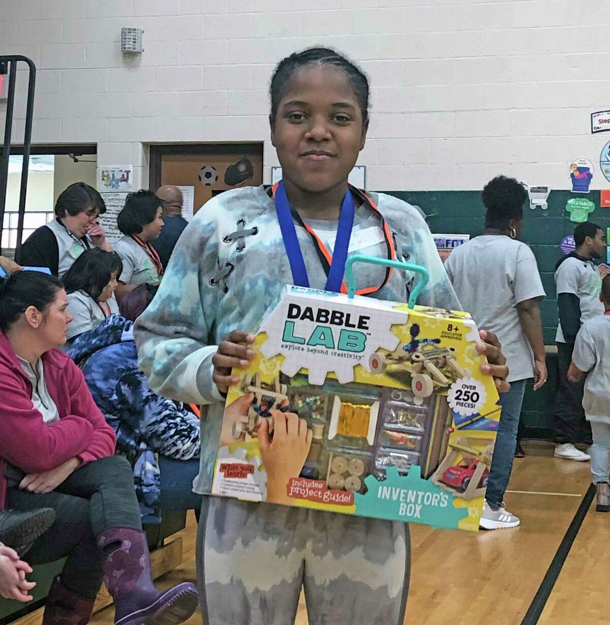 Baldwin Junior High School student Jazlyn Carter is pictured with the door prize she won at the 2020 STEAM Challenge. (Courtesy photo/TrueNorth Community Services)