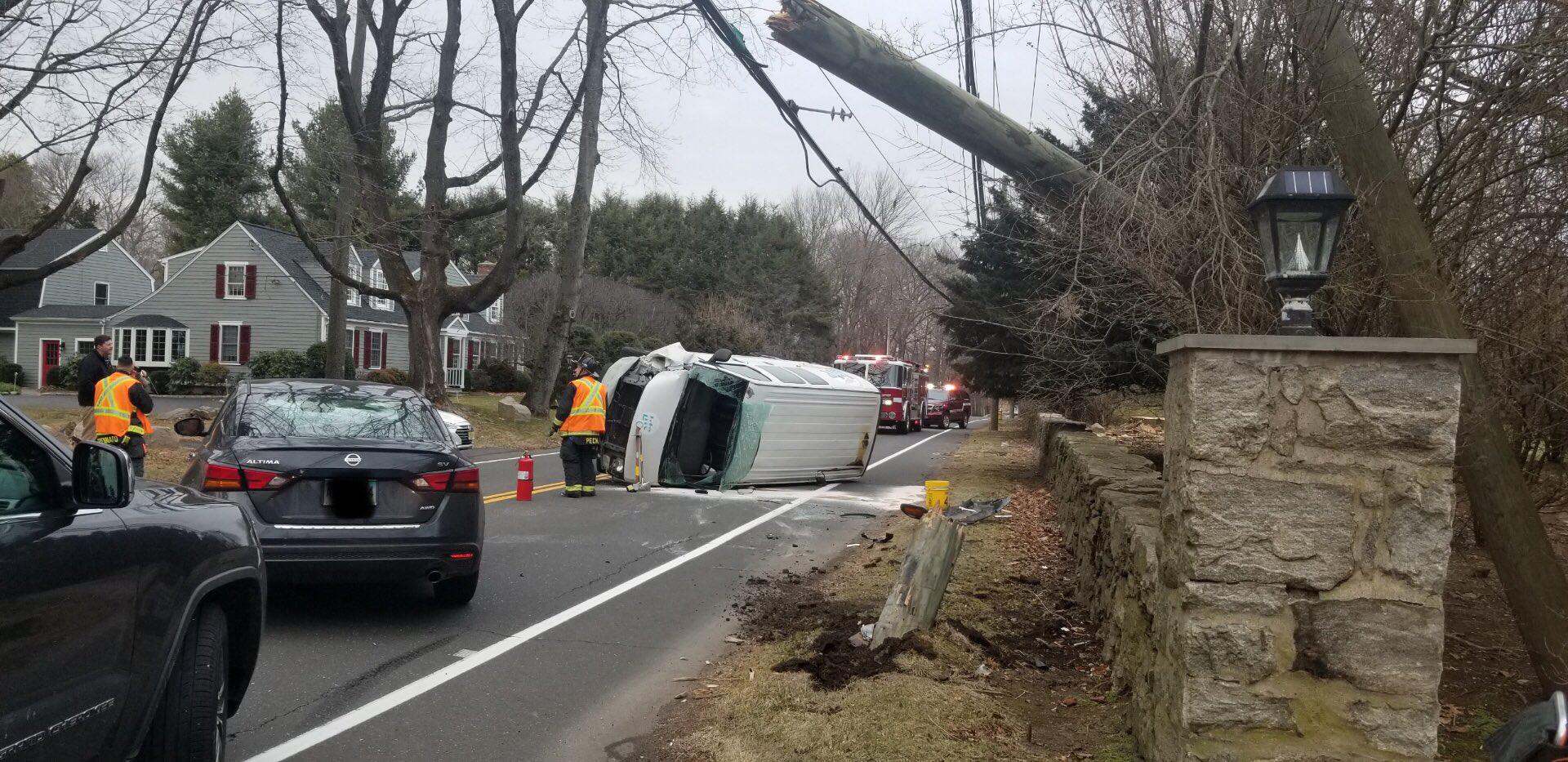 Driver hit utility pole in Westport, rolled over