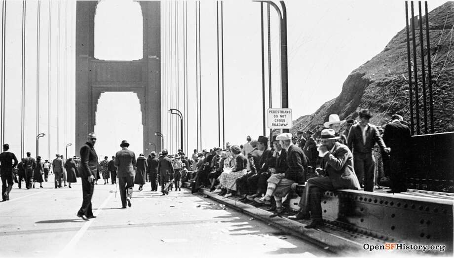 Then: Golden Gate Bridge Tons of people turned out for "Pedestrian Day" pictured here on May 27, 1937. The day marked the first time pedestrians were allowed to walk across the bridge since its completion that same year. Photo: OpenSFHistory / Wnp37.02015.jpg