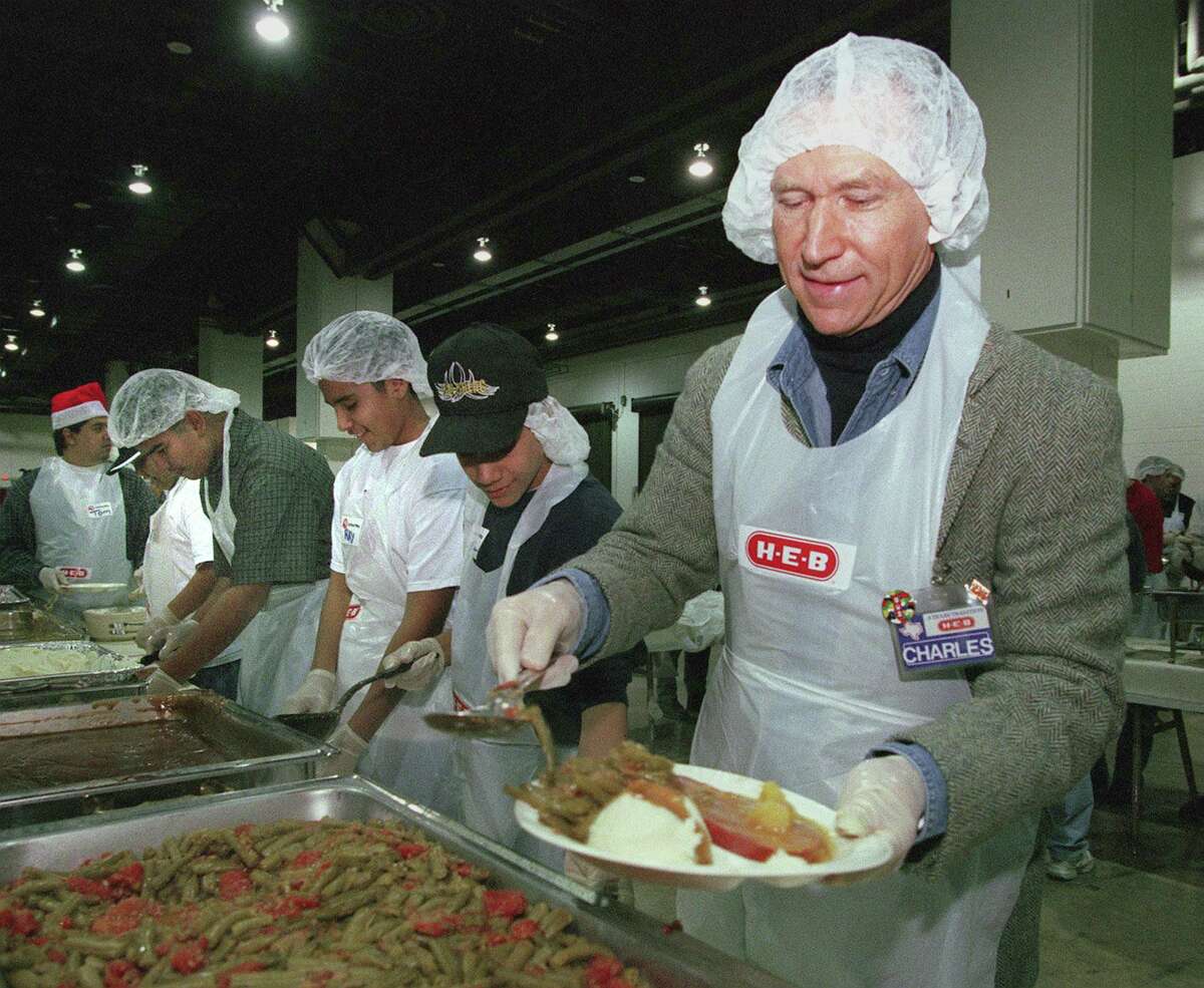H-E-B CEO and Chairman Charles Butt helps serve food at its1998 Feast of Sharing. A reader celebrates H-E-B’s success and commends Butt for his excellent leadership through the years.