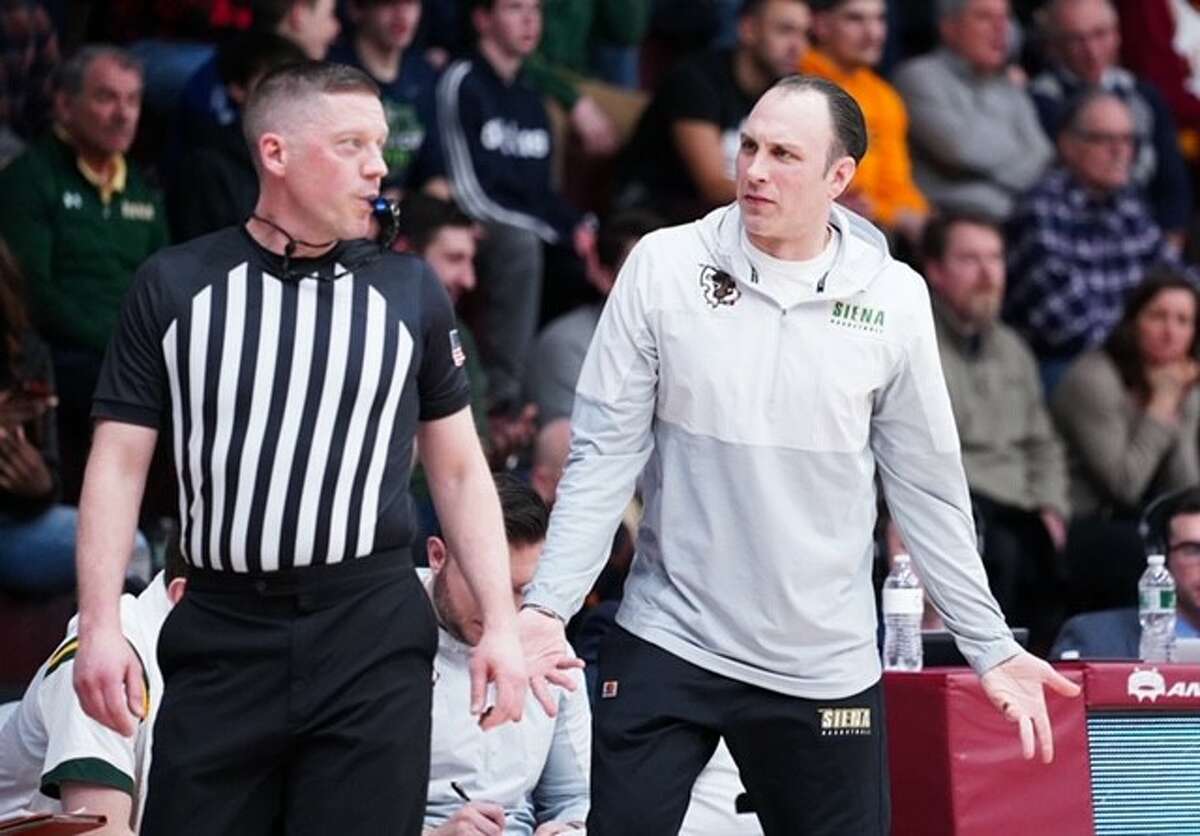 Siena basketball coach Carmen Maciariello, right, will have to wait a while before his 8-2 team returns to the court after Wednesday night's game against Canisius was postponed. (Geraldo Rodriguez / Special to the Times Union)