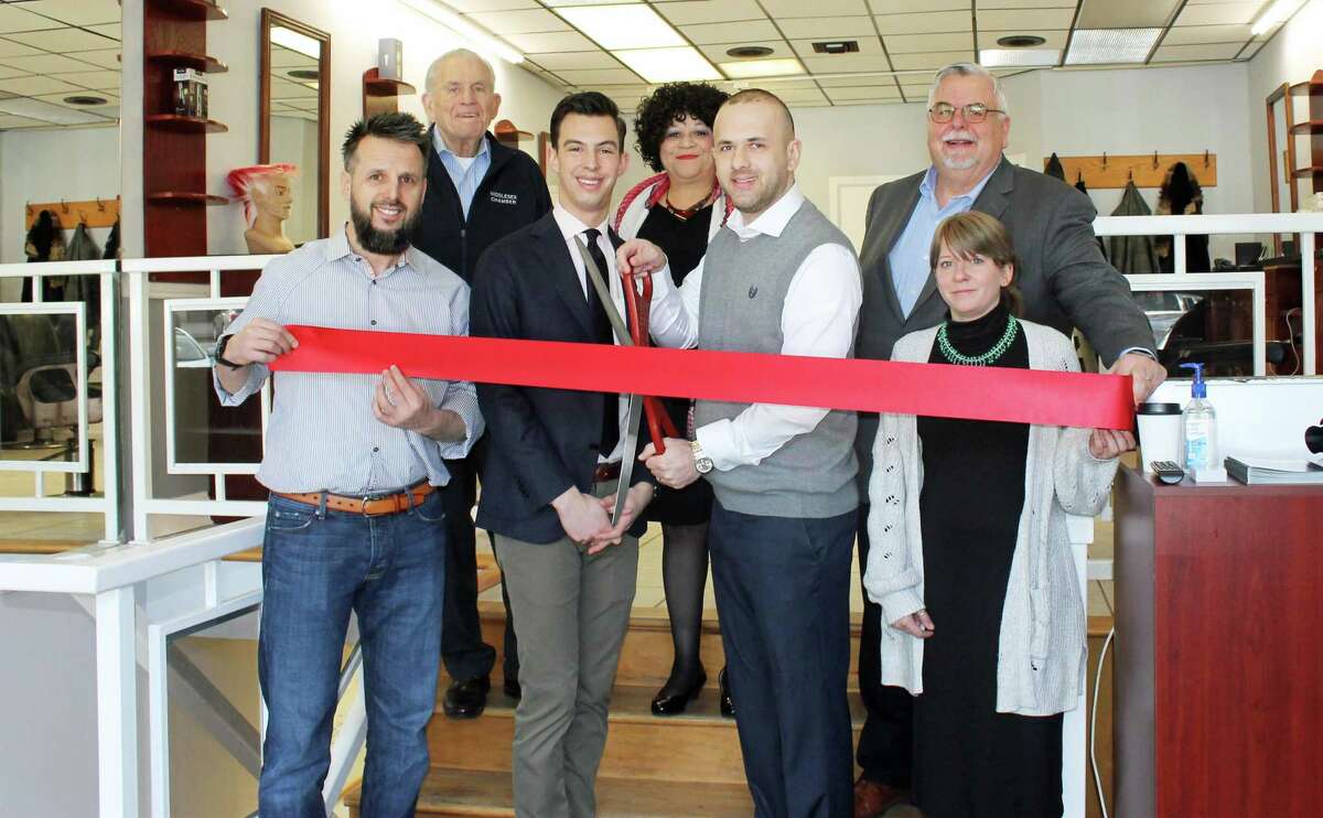 Officials gathered for the grand opening of MC Barber at 346 Main St. Middletown, last week. From left are owner and barber/school educator Merhan Cecunjanin, Chamber President Larry McHugh, Mayor Ben Florsheim, Central Business Bureau Chairwoman Pam Steel, owner and school director Admir Cecunjanin, Chamber Chairman Don DeVivo and Barber Rebecca Thomas.
