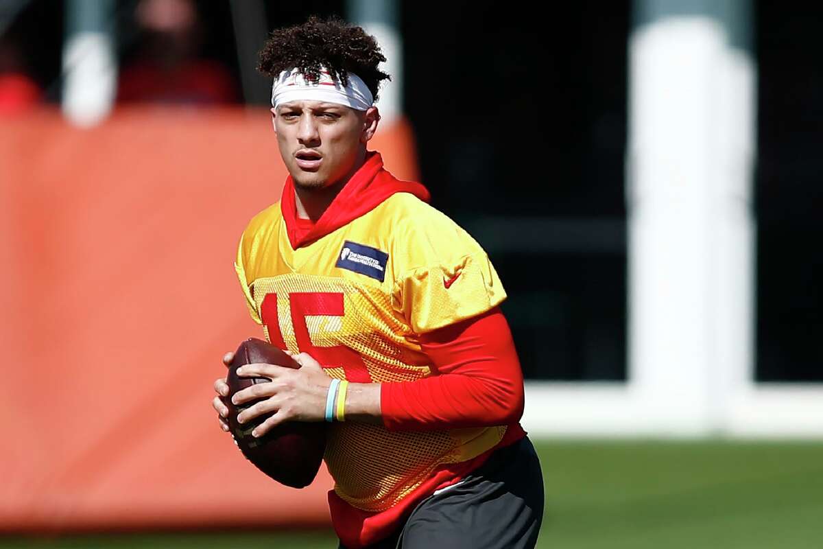 Kansas City Chiefs quarterback Patrick Mahomes (15) runs drills during practice on Wednesday, Jan. 29, 2020, in Davie, Fla., for the NFL Super Bowl 54 football game. (AP Photo/Brynn Anderson)