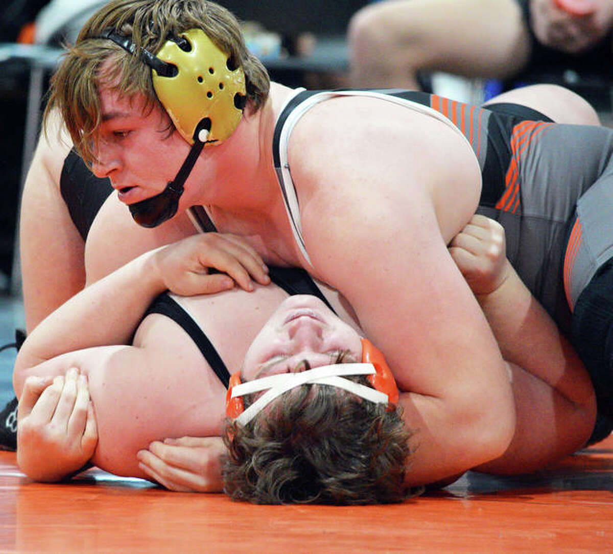 Edwardsville’s Blake Moss is on his way to a way to a pin over Normal West’s Tyler Spence.