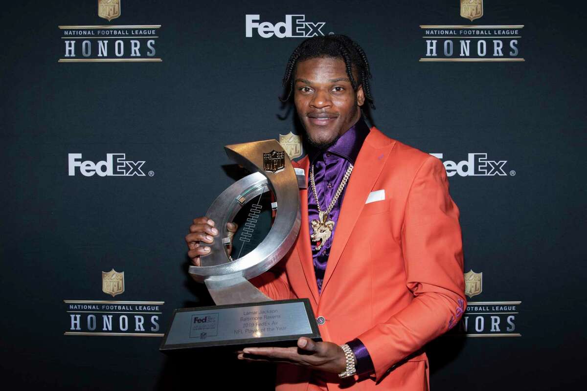 IMAGE DISTRIBUTED FOR FEDEX - Lamar Jackson, of the Baltimore Ravens, accepts the 2019 FedEx Air Player of the Year award at the NFL Honors at the Adrienne Arsht Center on Saturday, Feb. 1, 2020 in Miami. FedEx donated $20,000 in his name to the USO. FedEx is the Official Delivery Service Sponsor of the NFL. (Omar Vega/AP Images for FedEx)