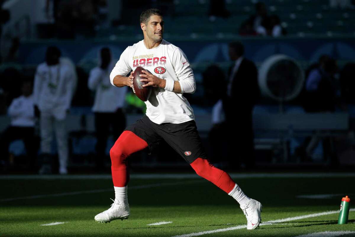 San Francisco 49ers quarterback Jimmy Garoppolo warms up before the NFL Super Bowl 54 football game between the San Francisco 49ers and Kansas City Chiefs Sunday, Feb. 2, 2020, in Miami Gardens, Fla.