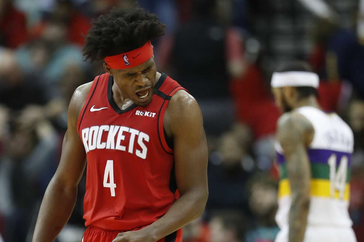 Houston Rockets forward Danuel House Jr. (4) reacts after shooting a three-pointer that solidified the Rockets lead over the New Orleans Pelicans during the second half of an NBA basketball game at Toyota Center in Houston, Sunday, Feb. 2, 2020.