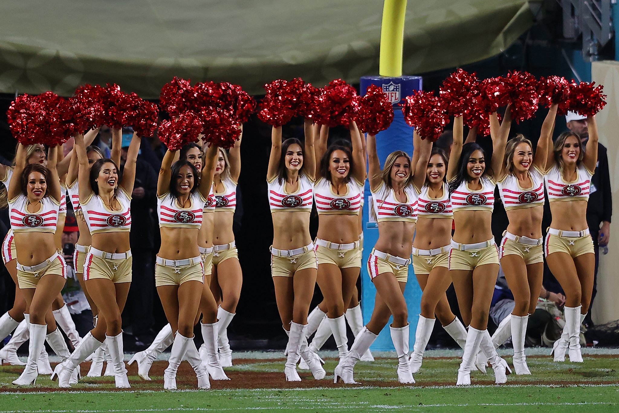 Looks We Love: NFL Cheerleaders' Bold Color Rush Uniforms!  Buccaneers  cheerleaders, Football cheerleaders, Nfl cheerleaders