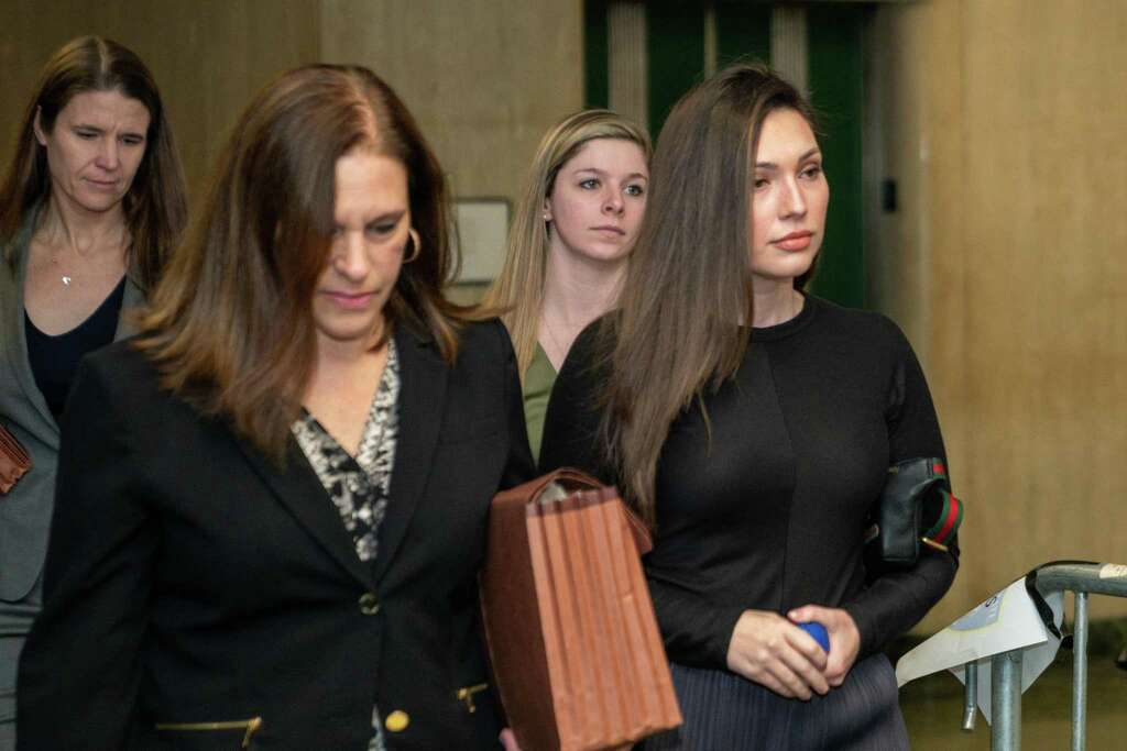 <p>Key prosecution witness Jessica Mann, right, arrives at Manhattan criminal court to testify at the sex assault trial of Harvey Weinstein on Friday in New York City. Weinstein, a movie producer whose alleged</p>