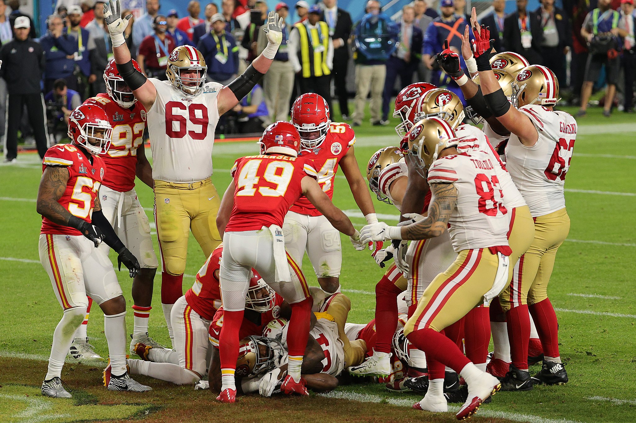 Kansas City Chiefs safety Daniel Sorensen (49) intercepts the ball