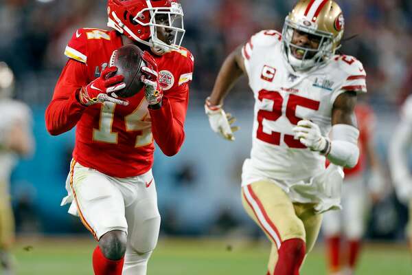 Kansas City Chiefs receiver Sammy Watkins catches a long pass in front of San Francisco 49ers’ cornerback Richard Sherman in the fourth quarter of the Chiefs’ 31-20 win in Super Bowl LIV.