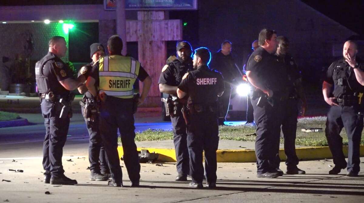 Harris County Sheriff's Office deputies investigate a deadly crash on Bammel North Houston Road at Champions Forest Drive on Sunday, Feb. 2, 2020.