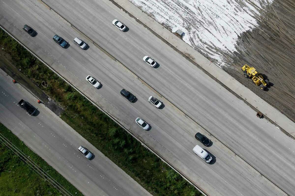 An aerial view of cars driving next to construction on Interstate 45.