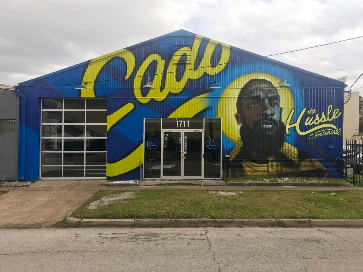 A new mural honoring the late rapper Nipsey Hussle has taken over the front facade of a fitness gym in east downtown Houston.