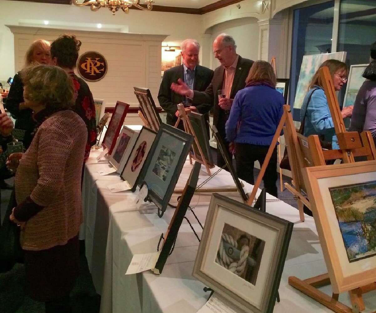 ASOG artists and guests viewing the artwork and socializing at the 2019 Winterfest dinner and art show.