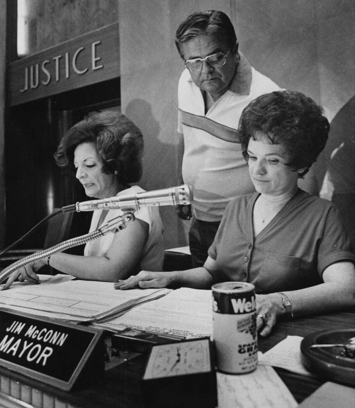 Mayor Jim McConn looks over City Secretary Anna Russell's shoulder on election night on Aug. 11, 1979, before the days of computerized election returns. The woman at left is assistant Becky Demeris.