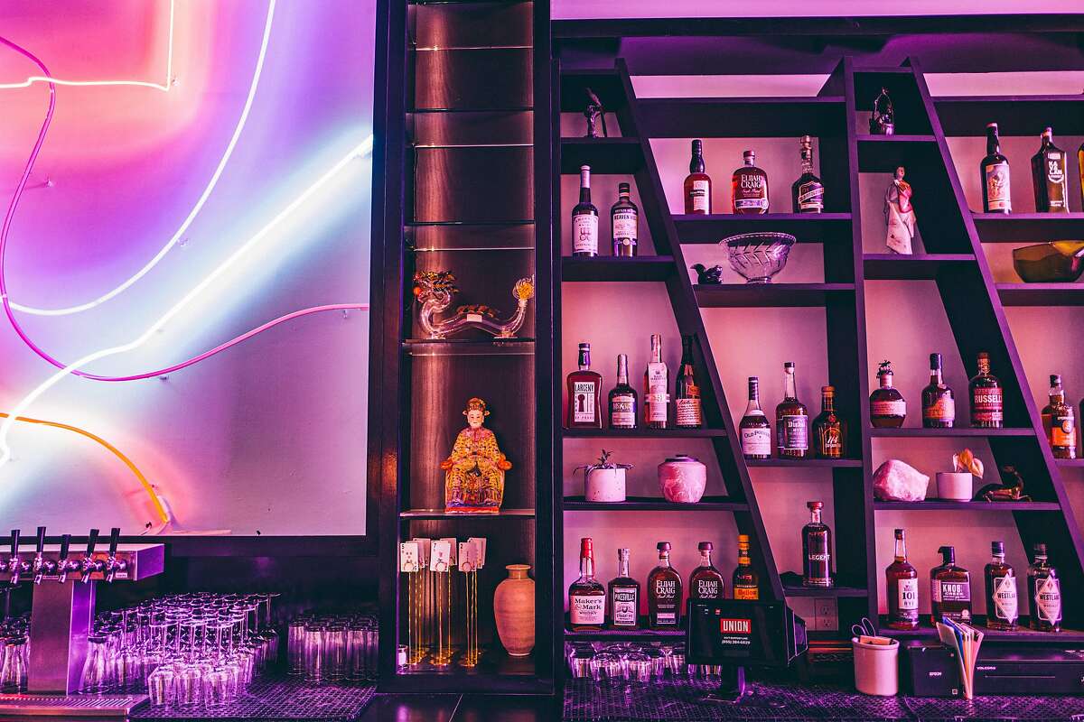 Chef Brandon Jew and his wife Anna Lee designed the interior of Oakland cocktail bar Viridian, which is full of neon and Asian touches.