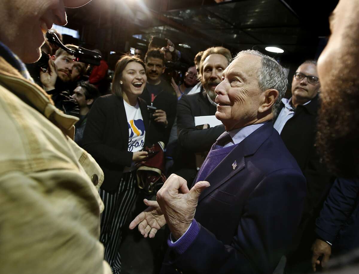 Democratic presidential candidate and former New York City Mayor Michael Bloomberg meets with supporters during a campaign stop in Sacramento, Calif., Monday, Feb. 3, 2020. (AP Photo/Rich Pedroncelli)