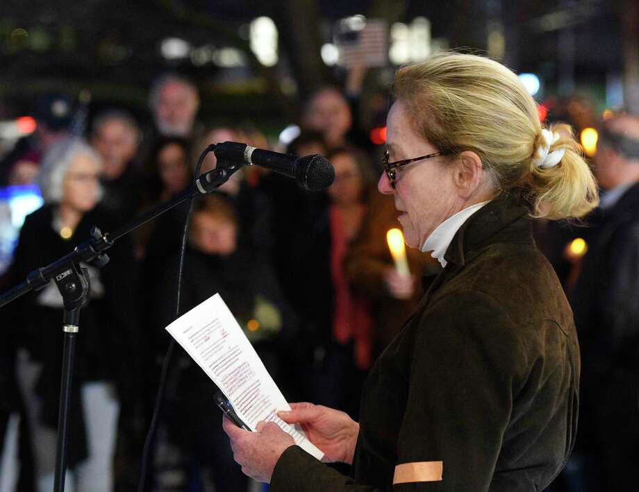 Indivisible co-founder Joanna Swomley speaks at the Indivisible Greenwich rally against the firing of Attorney General Jeff Sessions outside Town Hall in Greenwich, Conn. Thursday, Nov. 8, 2018. Indivisible Greenwich, a group "dedicated to fighting the anti-democratic actions and policies of the Trump Administration," claims President Trump crossed a line by firing Jeff Sessions and potentially interfering with the Mueller investigation. The rally in Greenwich was one of 14 in Connecticut and about 900 nationally. Photo: Tyler Sizemore / Hearst Connecticut Media / Greenwich Time