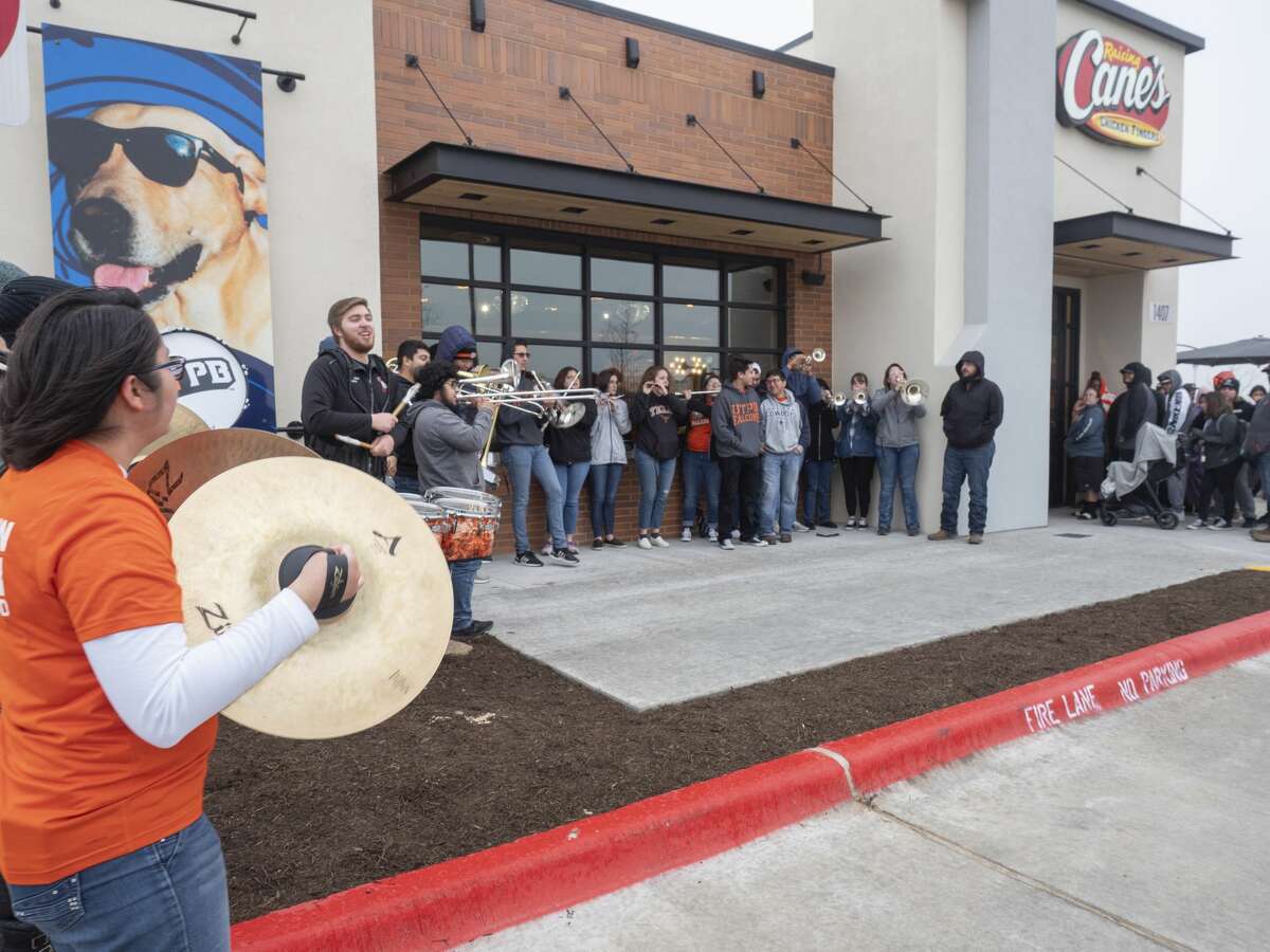 UTPB band members keep the crowd entertained 02/04/20 morning at the grand opening of Midland's Raising Cane's. Tim Fischer/Reporter-Telegram