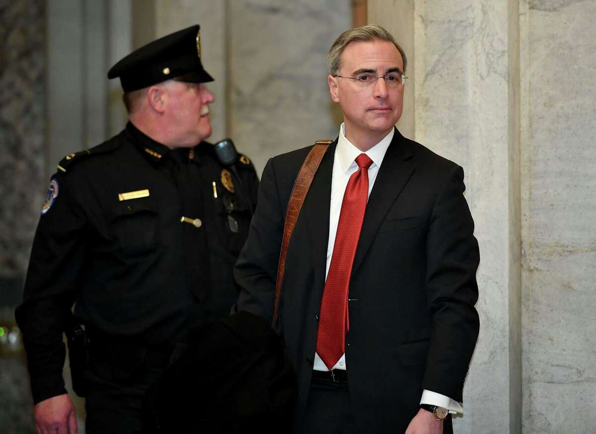 Trump Defense team lawyer Pat Cipollone arrives for the impeachment trial of US President Donald Trump on Capitol Hill on Thursday in Washington.