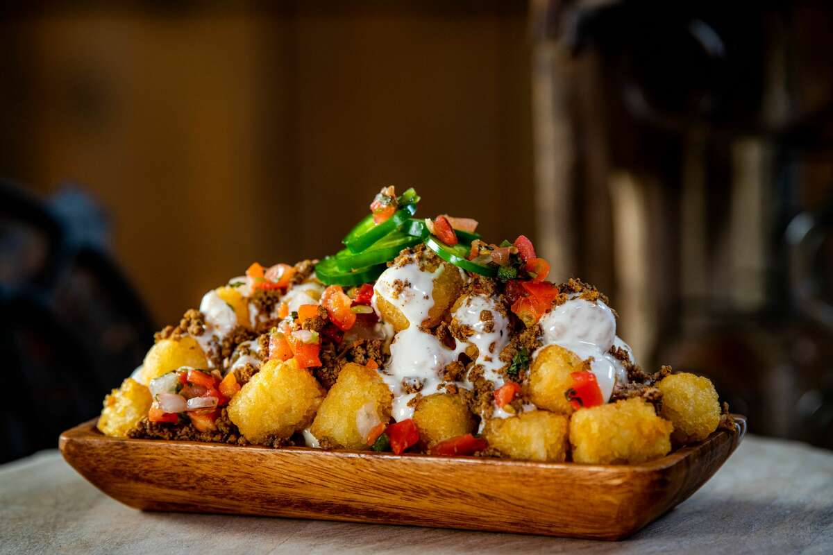 El Presidente TotsTater tots, queso blanco, beef picadillo, pico de gallo, fresh sliced jalapenos.(Available at Bayou City Marketplace Sections 126 and 409)