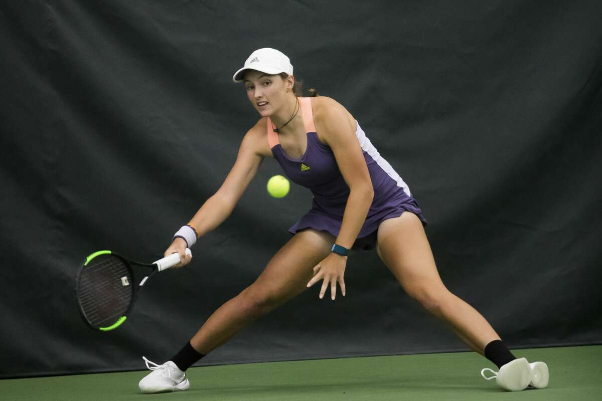Ellie Coleman of Midland returns the ball in a match against Yanina Wickmayer of Belgium during the Dow Tennis Classic Tuesday, Feb. 4, 2020. (Katy Kildee/kkildee@mdn.net)