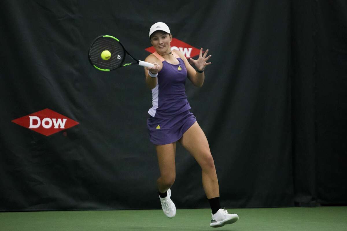Ellie Coleman of Midland returns the ball in a match against Yanina Wickmayer of Belgium during the Dow Tennis Classic Tuesday, Feb. 4, 2020. (Katy Kildee/kkildee@mdn.net)