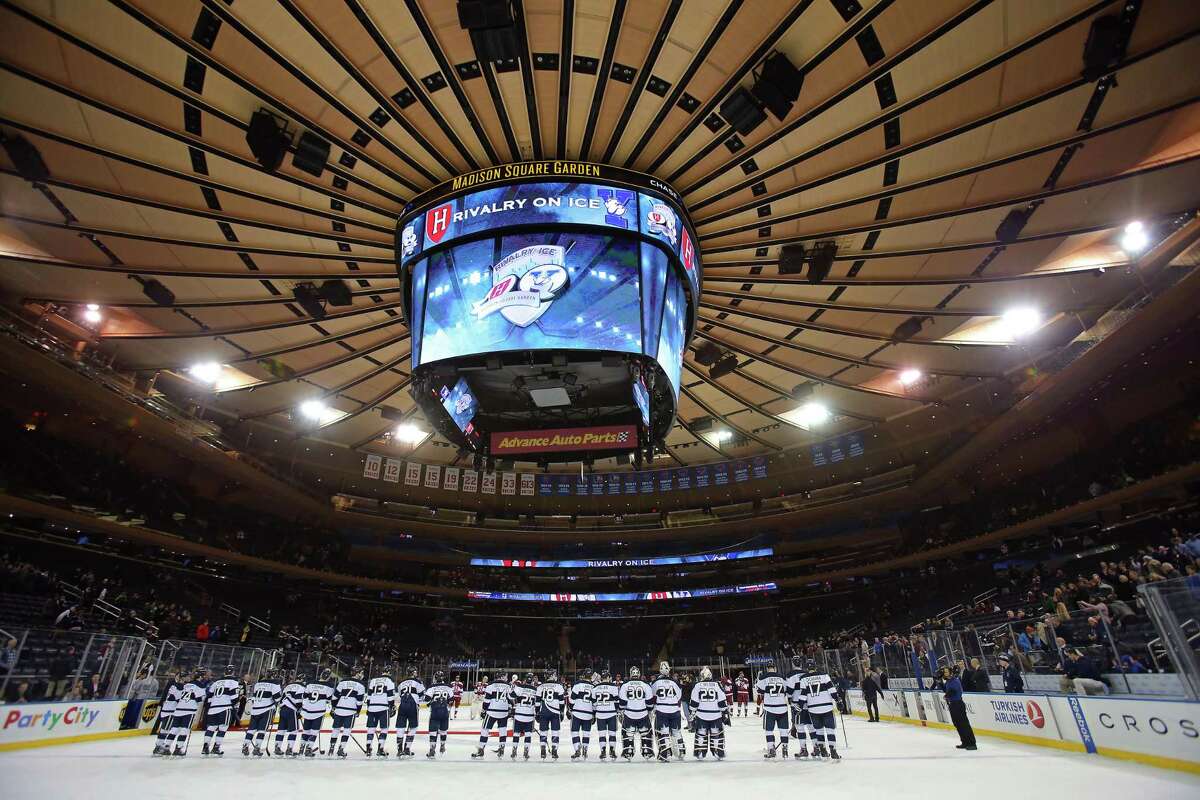 Players from the Harvard and Yale line up before the Rivalry on Ice game at Madison Square Garden in 2015. Yale will return to MSG next season to face Cornell its annual “Red Hot Hockey” game.