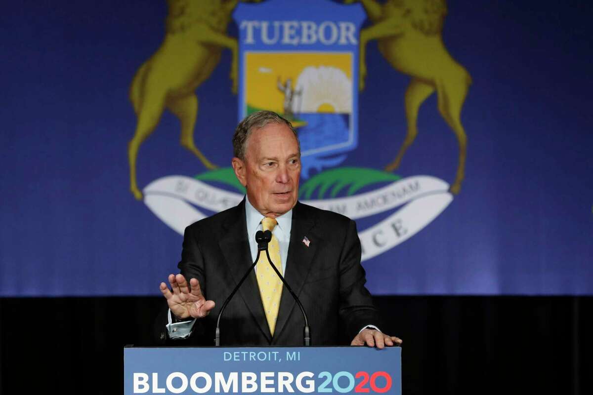 Democratic presidential candidate and former New York City Mayor Michael Bloomberg talks to supporters Tuesday, Feb. 4, 2020, in Detroit.
