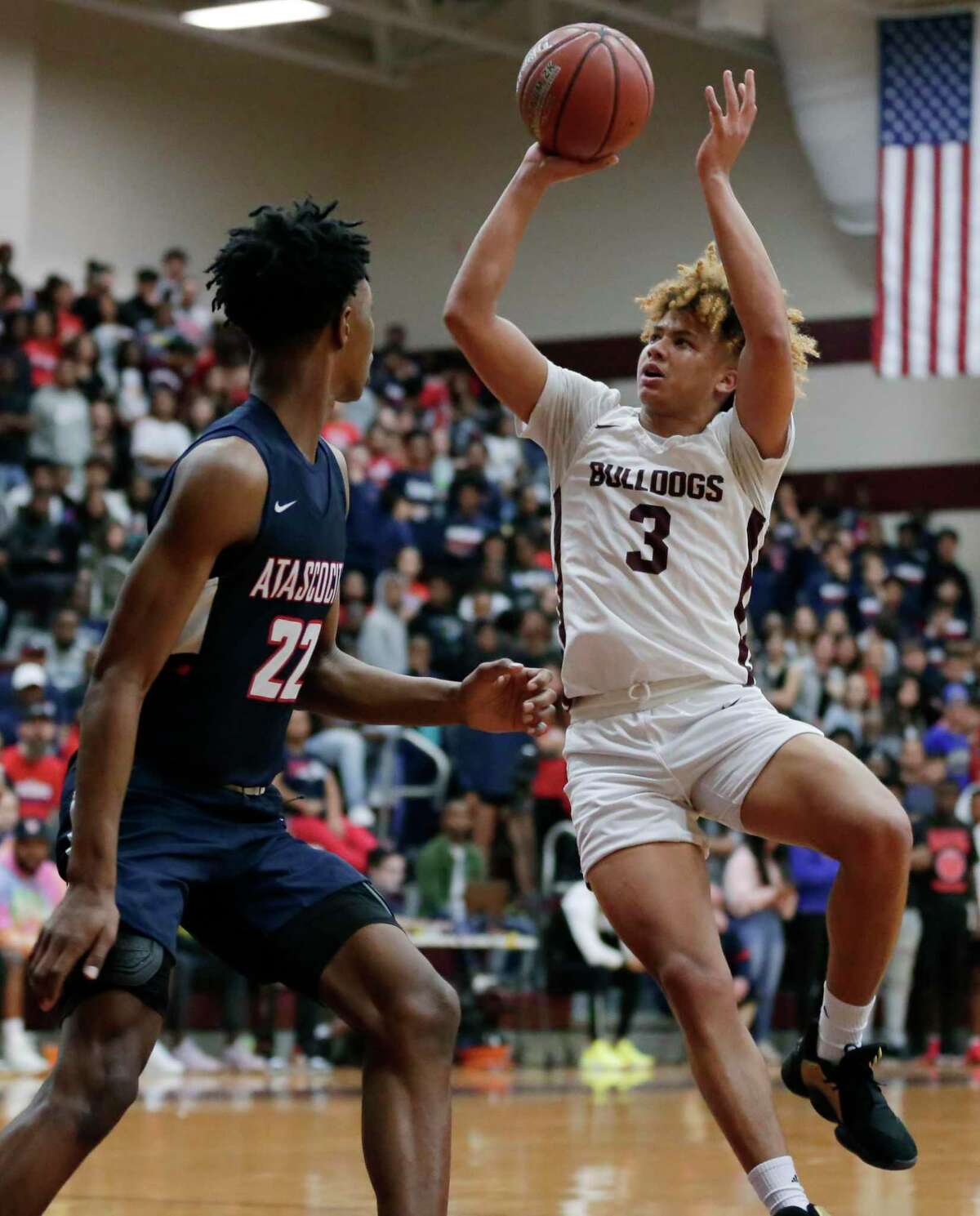 Summer Creek JaVon Jackson (3) puts up a shot over Atascocita guard Cameron Morrison (22) during the second half of a high school basketball game Tuesday, Feb. 4, 2020 in Houston, TX.