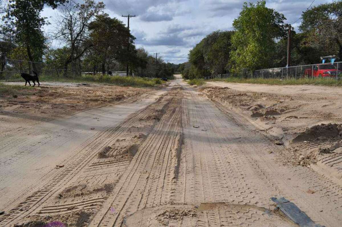 Unpaved roads like this persisted in Highland Oaks during Precinct 1 Commissioner Sergio “Chico” Rodriguez’s tenure. That’s one reason we recommend challenger Rebeca “Becky” Clay-Flores
