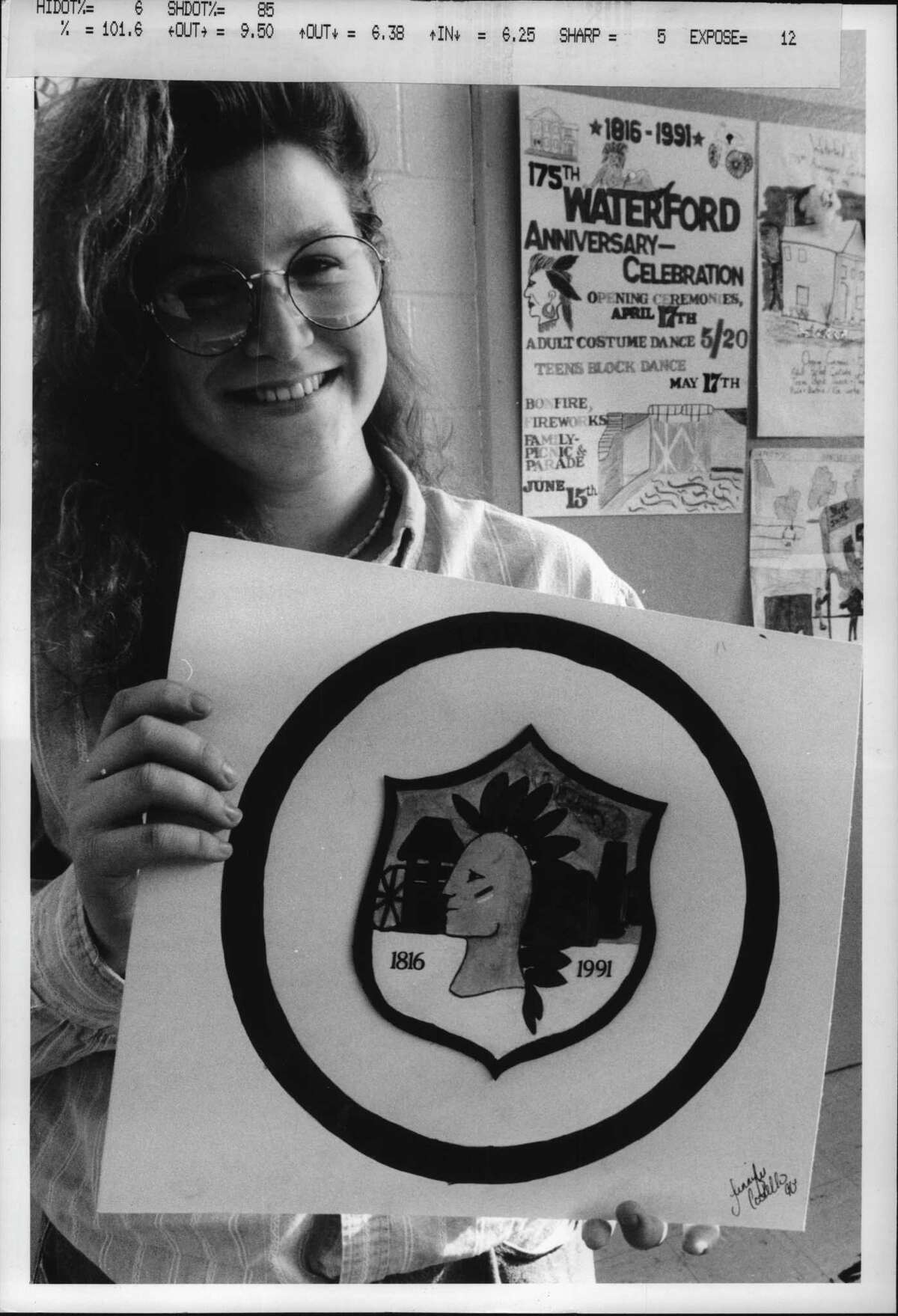 On this date in 1991, Jennifer Costello, a senior at Waterford Halfmoon High School, holds her first-place winner in the town of Waterfordas logo contest, as part of the 175th anniversary of the town. Her winning logo was to be placed on the newly created town flag. Feb. 6, 1991. (Paul D. Kniskern Sr./Times Union Archive)
