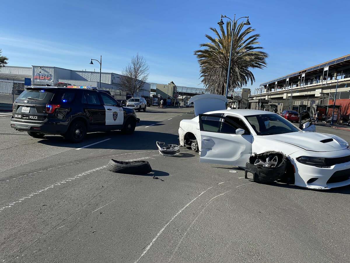 A photo of the car in which a driver attempted to make a getaway from the Oakland police. The short chase came to an end when the wheels melted and fell off the vehicle, which was filled with stolen goods.