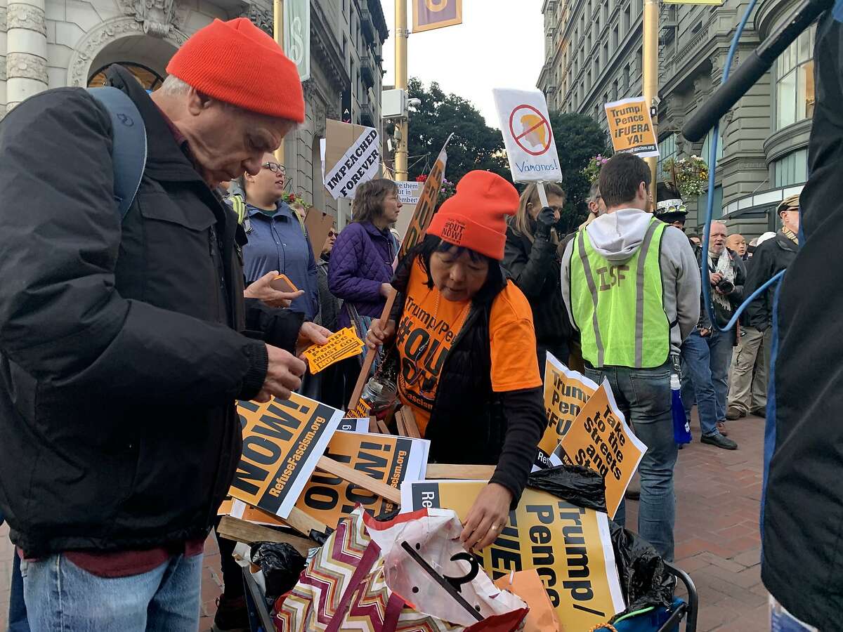 Dozens of anti-Trump protesters rallied at Market and Powell streets in San Francisco Wednesday afternoon to protest President Donald Trump’s acquittal in his impeachment trial, calling the acquittal a cover-up by the GOP.