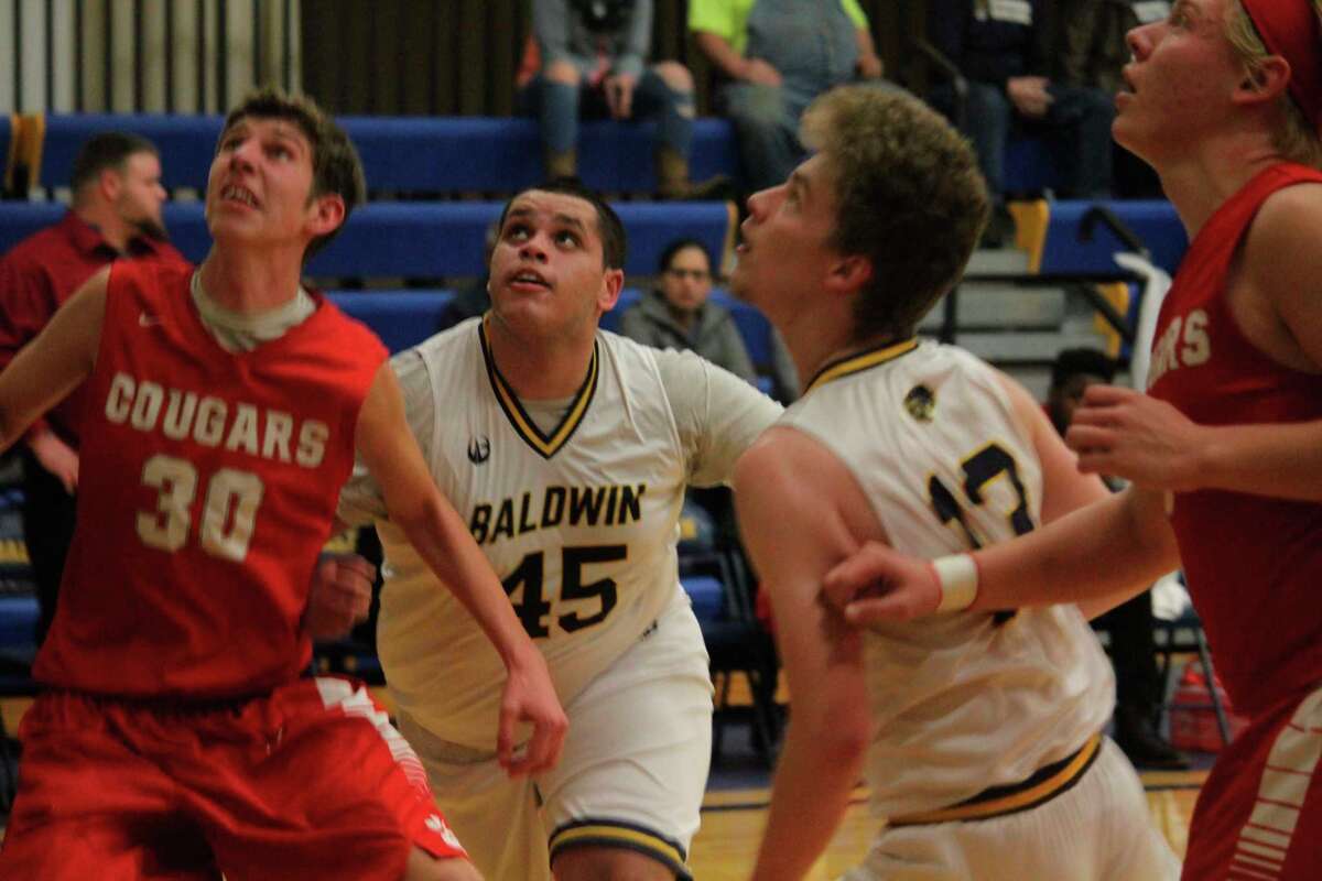 Baldwin's Darrion Hayter (45) looks for the rebound in recent action. (Star photo/John Raffel)
