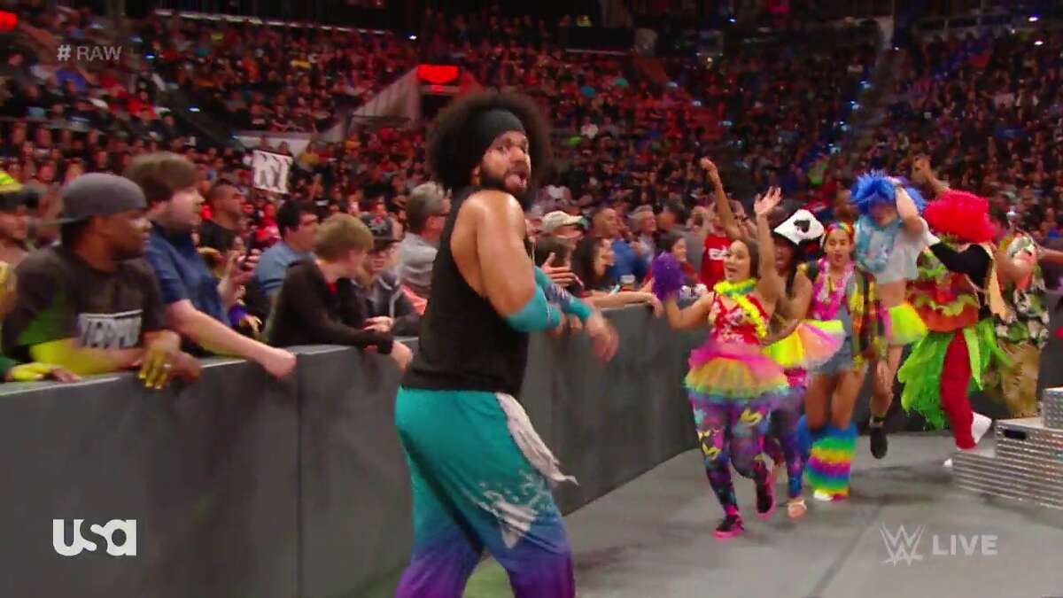 Screen captures taken from a recording show Laredo wrestler Rok-C leading the conga line behind No Way Jose at WWE Raw in San Antonio, Texas on Jan. 27.
