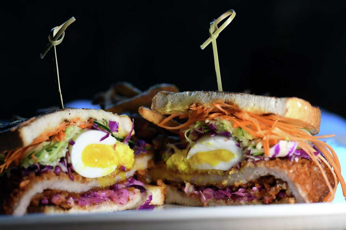 Pork katsu from The Bishop; fried pork filet, raw veggies, slaw, herbs, rice wine vinegar, soy aioli and egg on Tuesday, Jan. 21, 2020, on North Pearl Street in Albany, N.Y. (Will Waldron/Times Union)