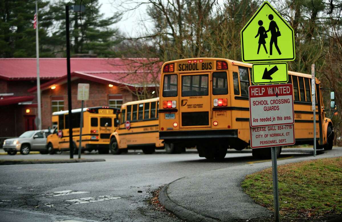 School lets out at Silvermine Elementary School Thursday, February 6, 2020, in Norwalk, Conn.
