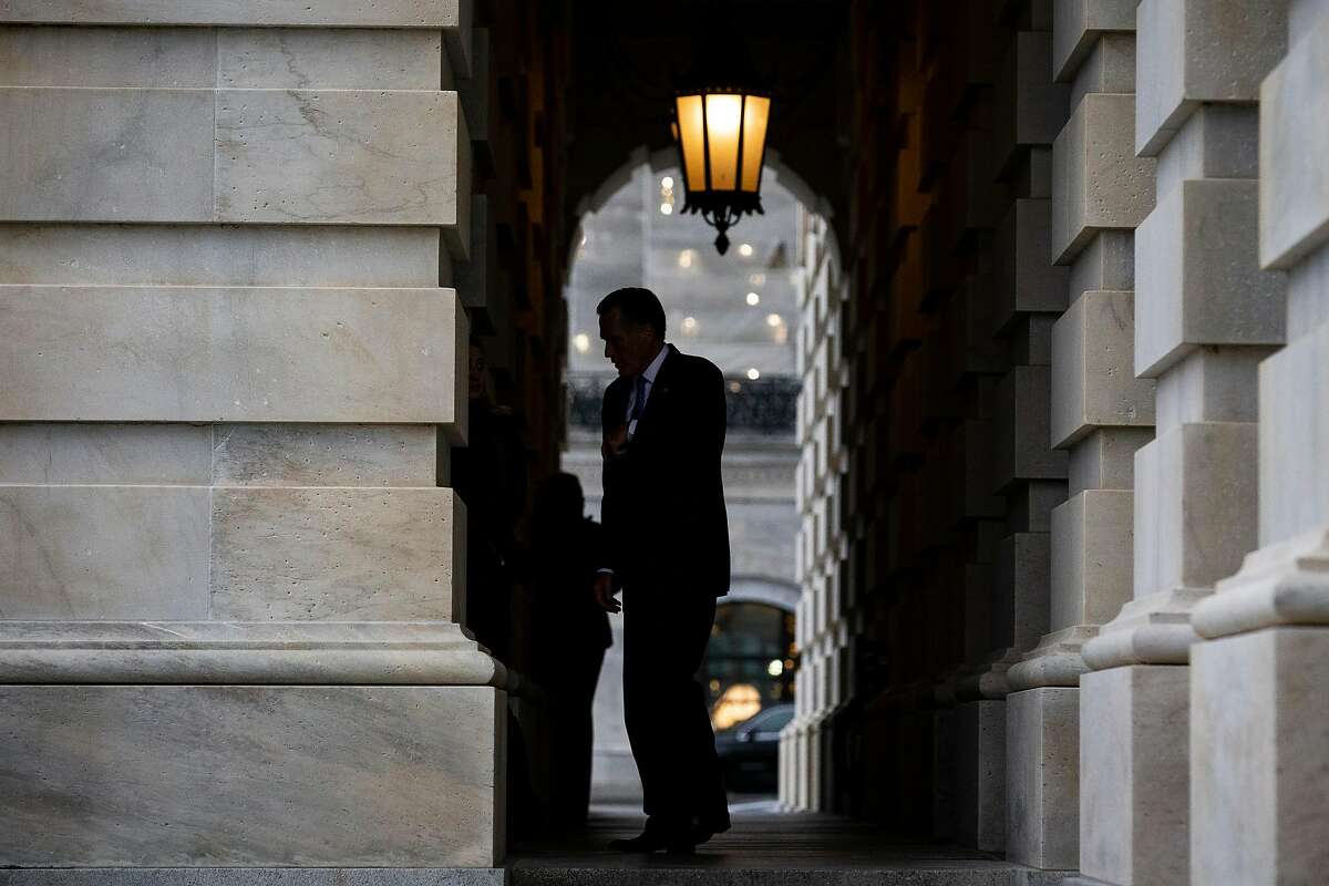 Sen. Mitt Romney (R-Utah) departs the Capitol after the Senate voted to acquit President Donald Trump on all articles of impeachment in Washington, Wednesday, Feb. 5, 2020. (Al Drago/The New York Times)