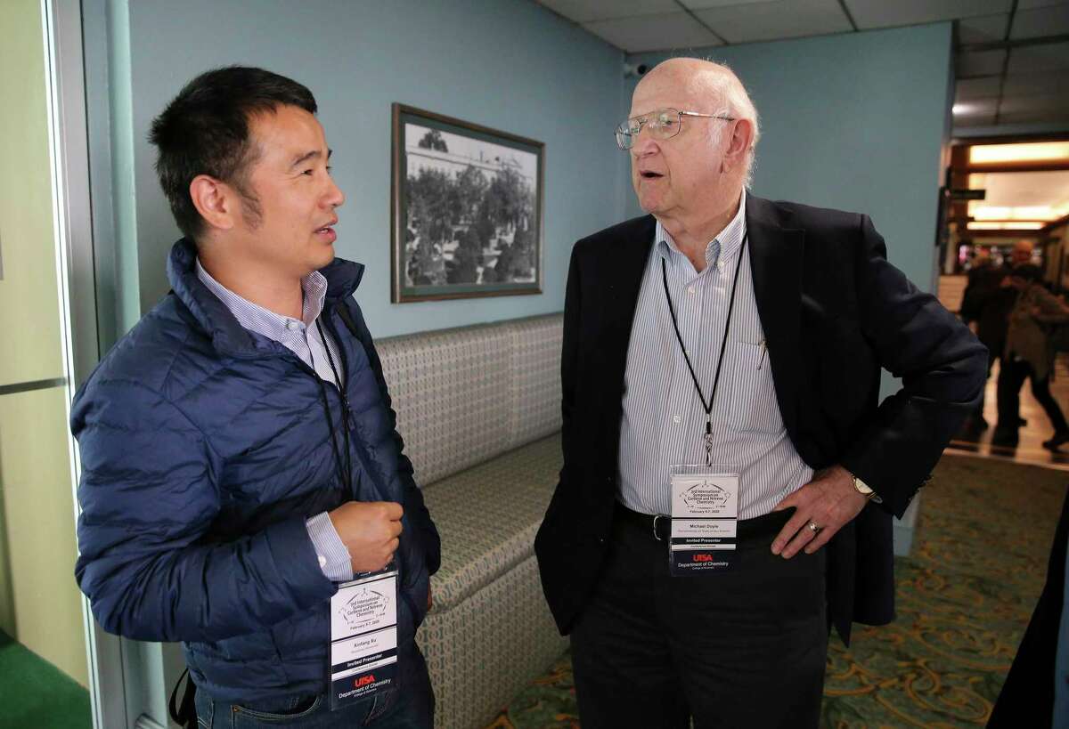 UTSA chemistry professor Michael Doyle (right) chats with Xinfang Xu, Ph.D. Professor of Chemistry, Soochow University during a chemistry conference sponsored by UTSA on Thursday, Feb. 6, 2020. Xu is stranded along with his family in San Antonio as flights back to China are cancelled. Attendance at the conference is down by 10 percent because some speakers could not leave China. Xu is hopeful that he and his family will eventually be able to find a flight home to Guangzhou.