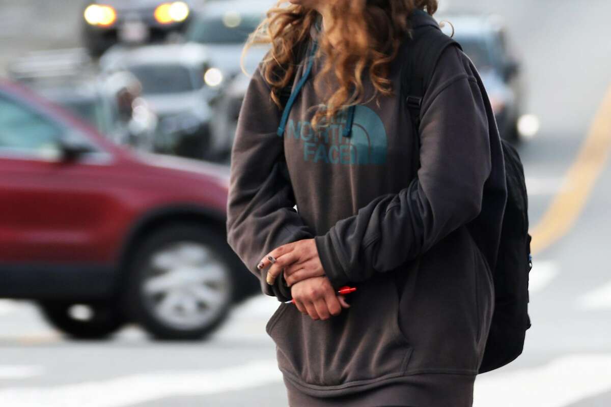A woman referred to as "individual M" at Castro and Market streets on Thursday, Jan. 30, 2020, in San Francisco, Calif. The man is on a list which San Francisco Supervisor Rafael Mandelman has created a list of 17 people who most need the city’s help.