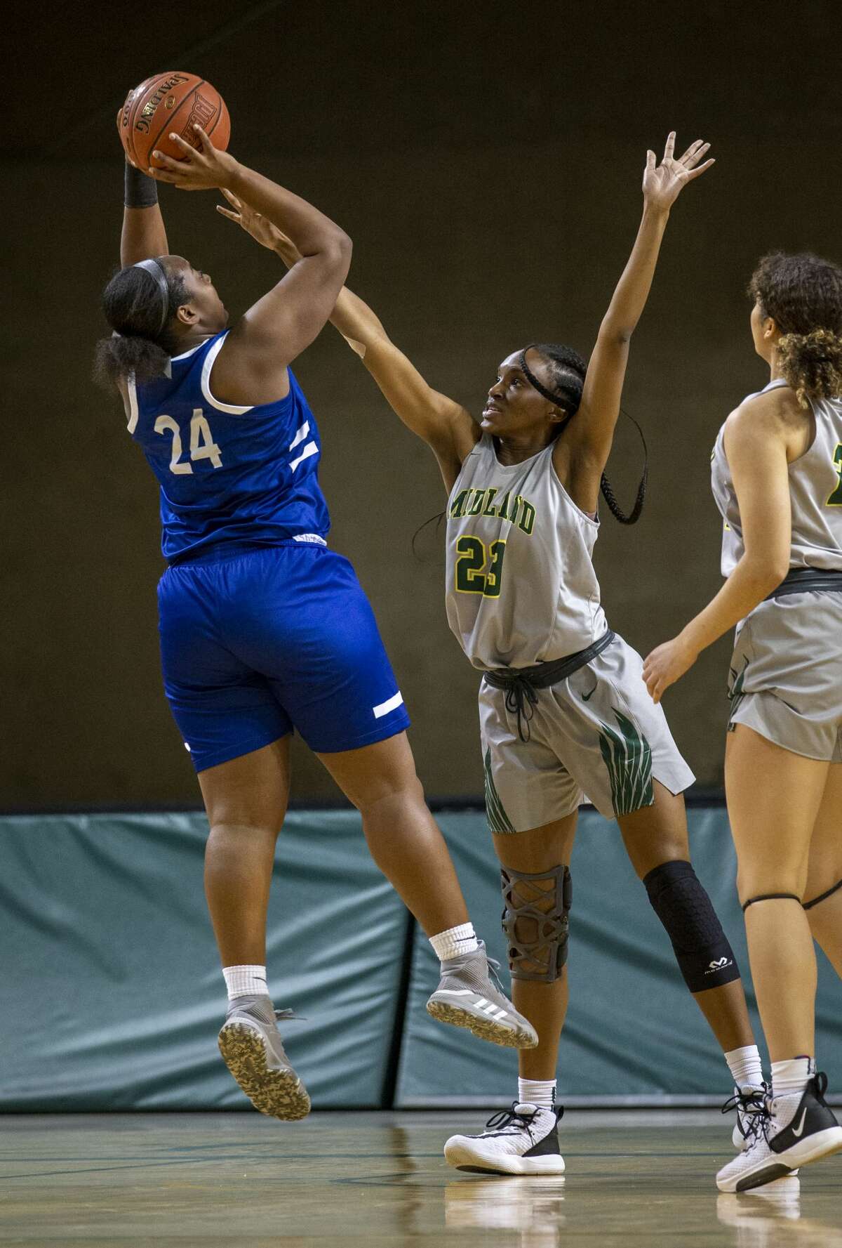 Midland College's Kyjai Miles attempts to block Western Texas College's Clarissa Francis shot Thursday, Feb. 6, 2020 at Chaparral Center.